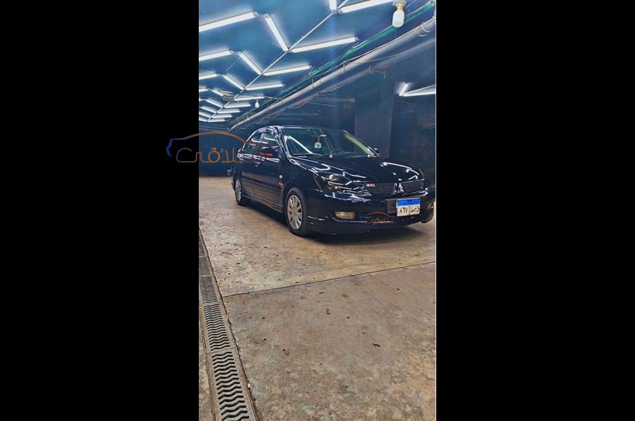 Lancer Puma Mitsubishi أسود