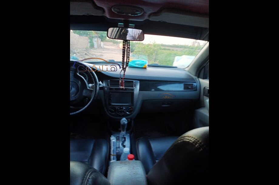 Optra Chevrolet أسود