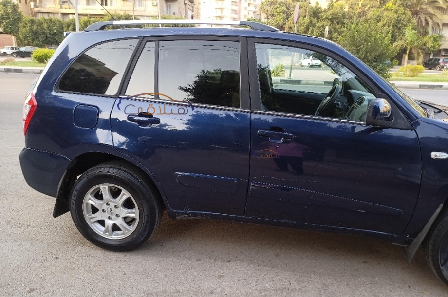 Tiggo Chery الأزرق الداكن