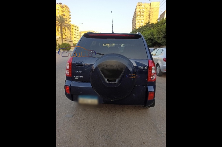 Tiggo Chery الأزرق الداكن