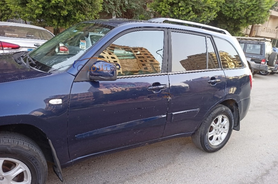 Tiggo Chery الأزرق الداكن