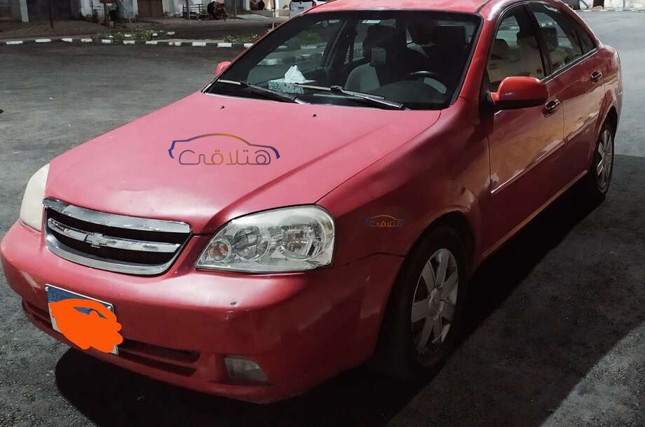 Optra Chevrolet احمر
