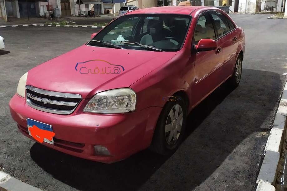 Optra Chevrolet احمر