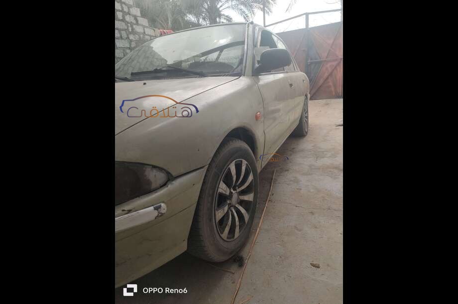 Wira Proton أخضر