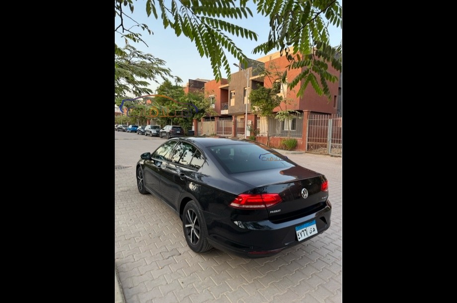 Passat Volkswagen أسود
