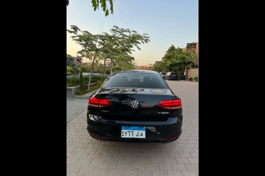 Passat Volkswagen أسود