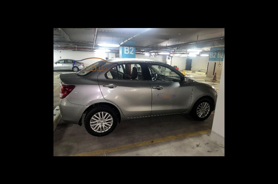 Dzire Suzuki فضي