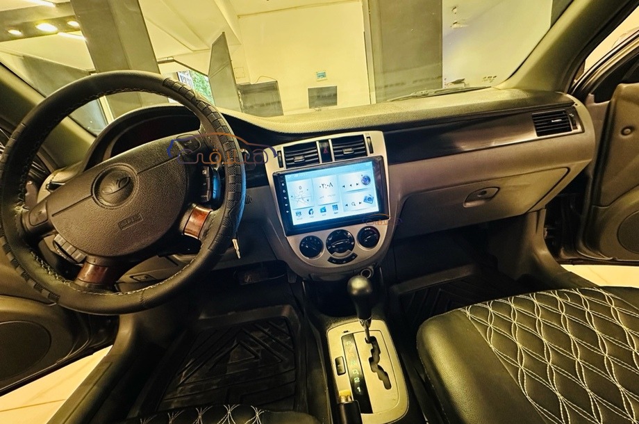 Optra Chevrolet فضي