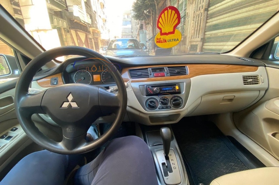 Lancer Puma Mitsubishi فضي