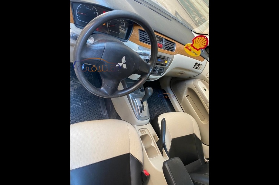 Lancer Puma Mitsubishi فضي