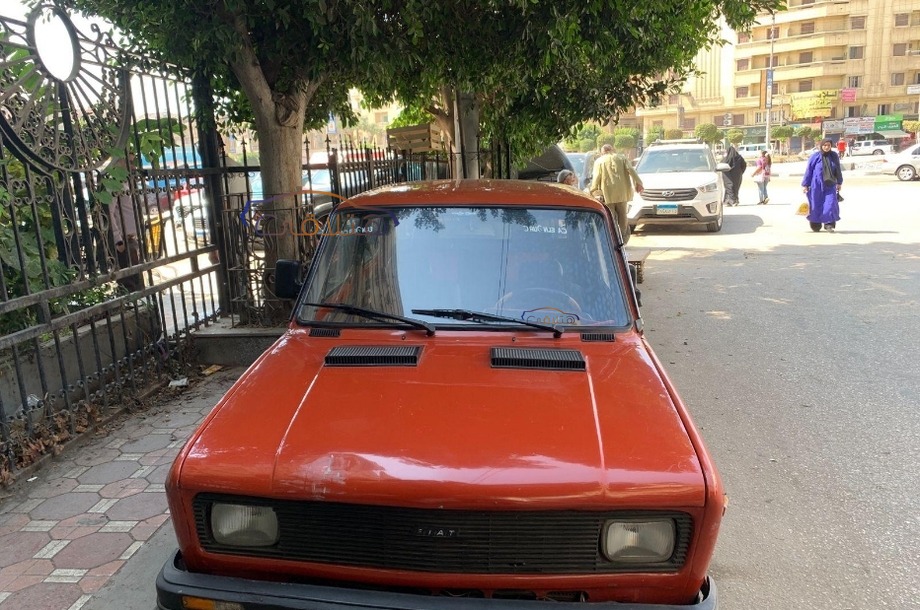 128 Fiat Dark red