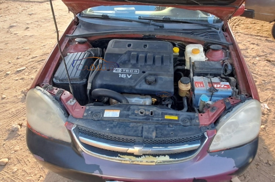 Optra Chevrolet احمر غامق