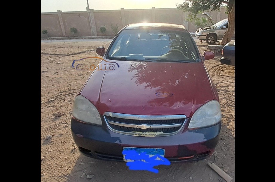 Optra Chevrolet احمر غامق