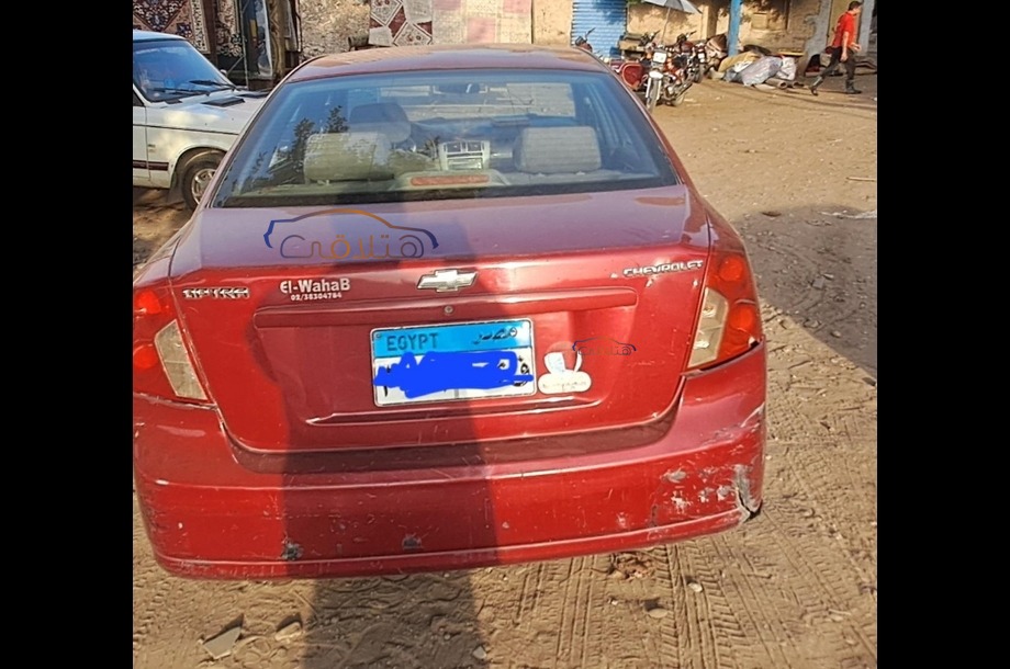 Optra Chevrolet احمر غامق