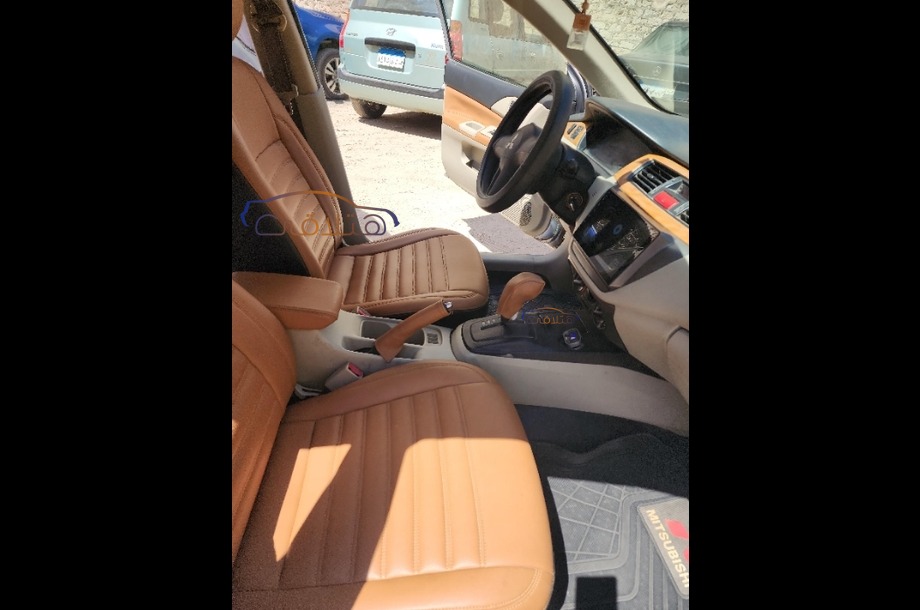 Lancer Puma Mitsubishi فضي