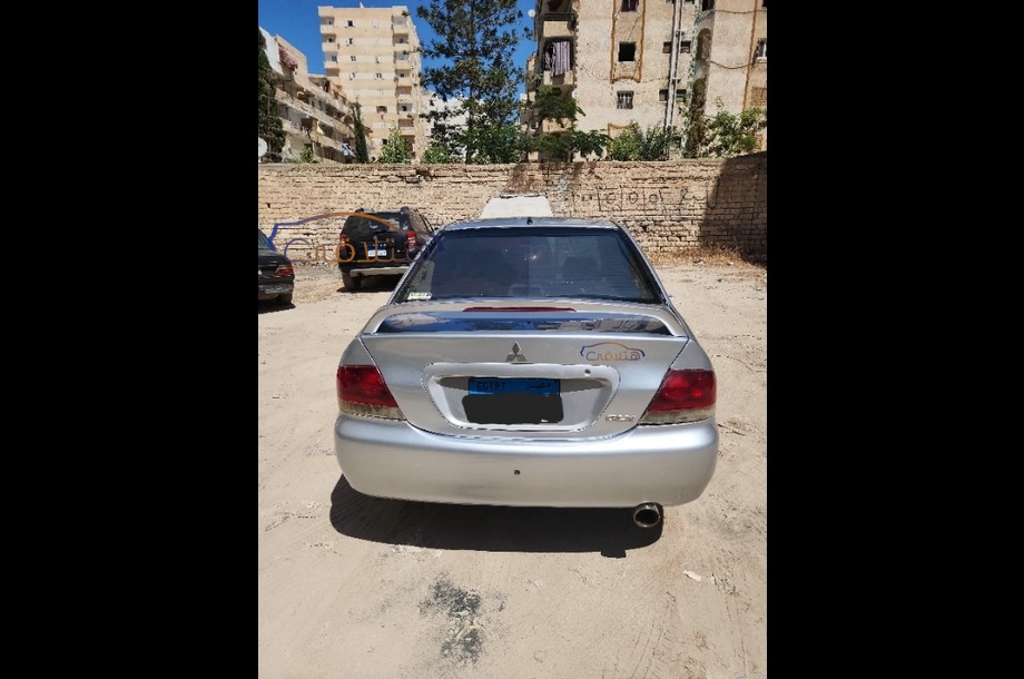 Lancer Puma Mitsubishi فضي