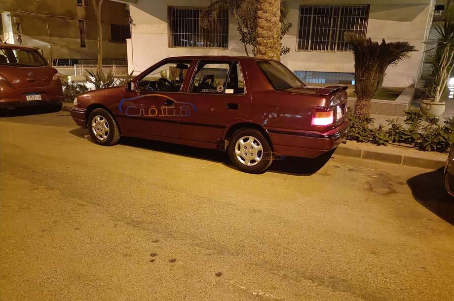 Excel Hyundai احمر غامق