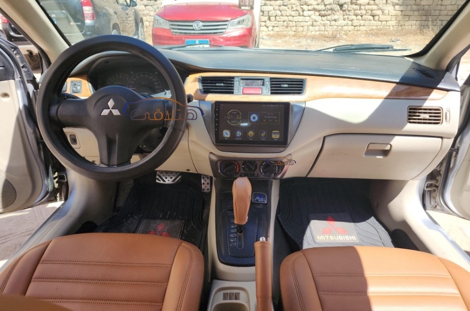 Lancer Puma Mitsubishi فضي