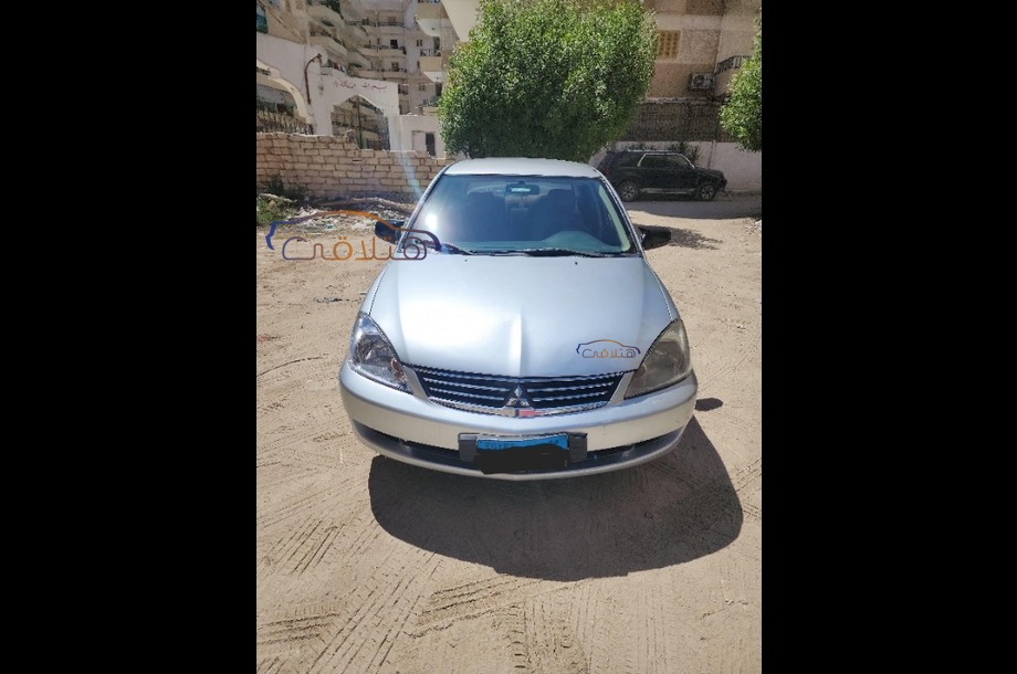 Lancer Puma Mitsubishi فضي