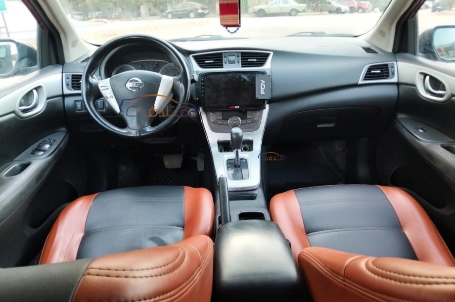 Tiida Nissan احمر