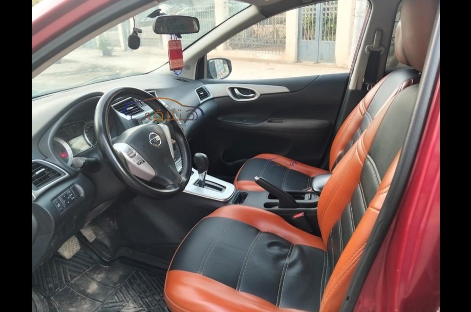 Tiida Nissan احمر