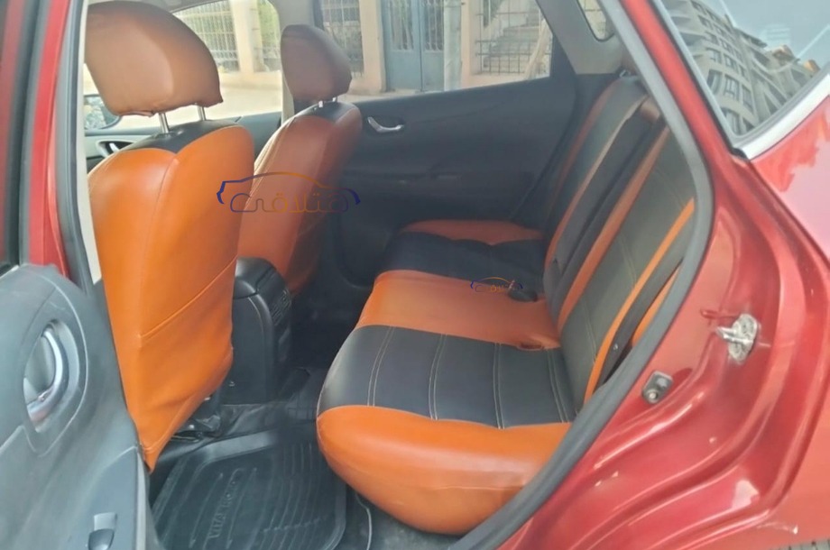 Tiida Nissan احمر