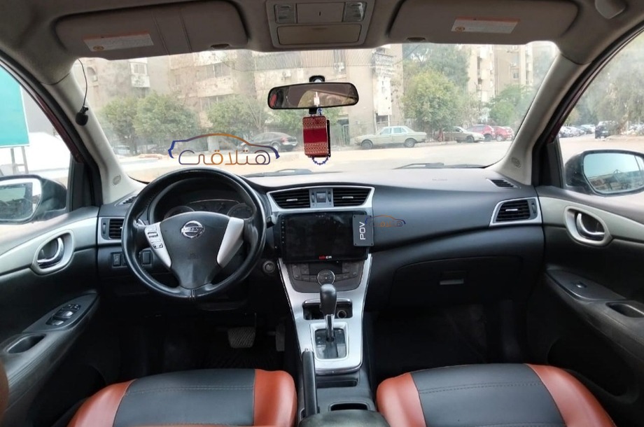 Tiida Nissan احمر