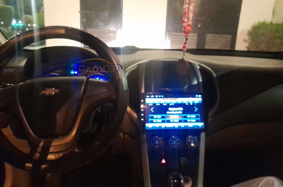 Optra Chevrolet احمر غامق