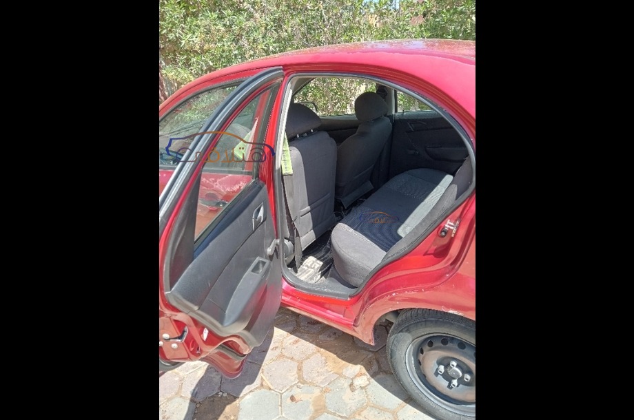 Aveo Chevrolet Dark red