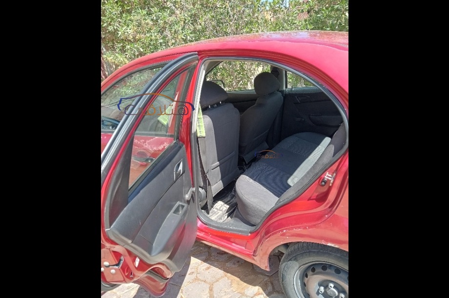 Aveo Chevrolet Dark red