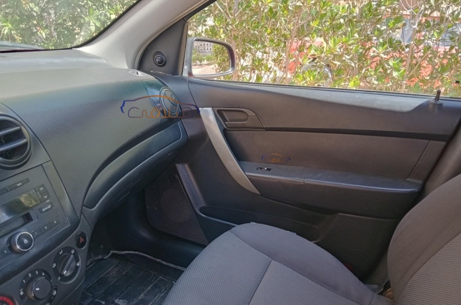 Aveo Chevrolet Dark red