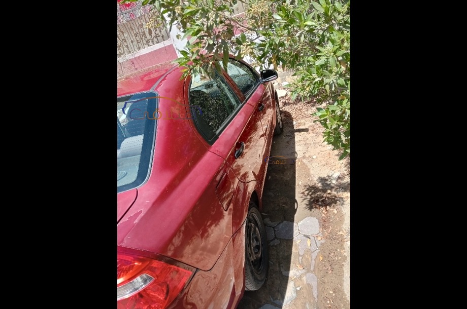 Aveo Chevrolet Dark red