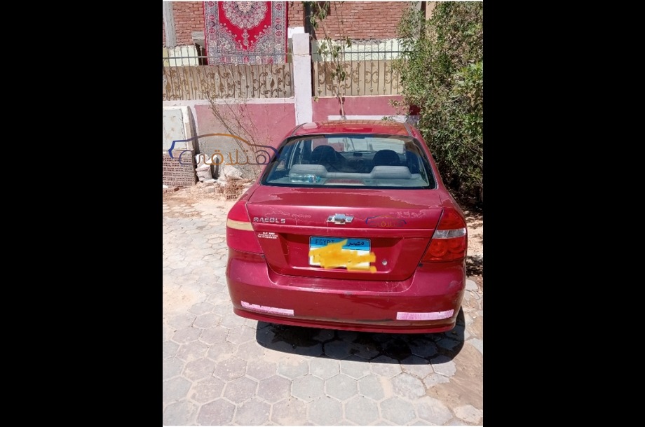 Aveo Chevrolet Dark red