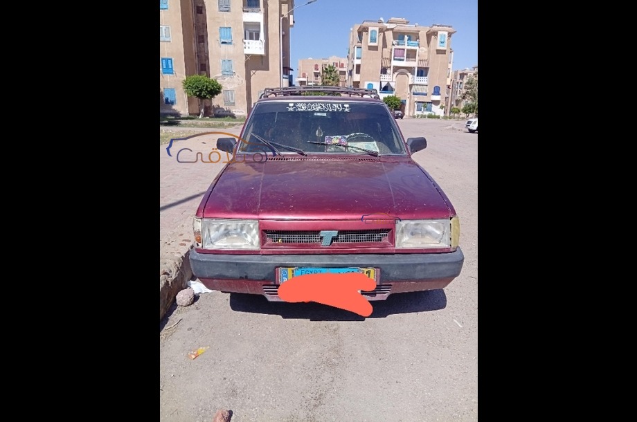 Dogan Fiat احمر غامق