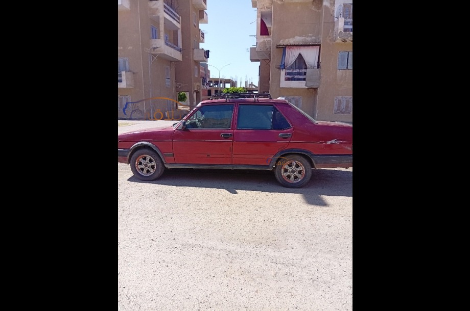 Dogan Fiat احمر غامق