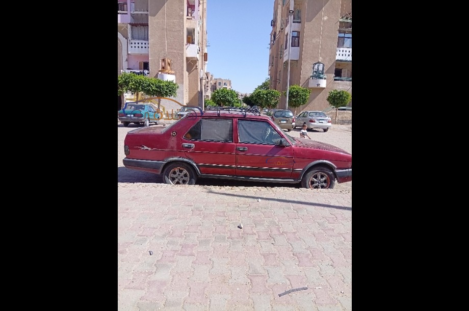 Dogan Fiat احمر غامق