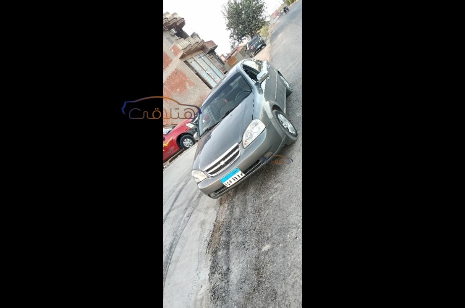 Optra Chevrolet رمادي