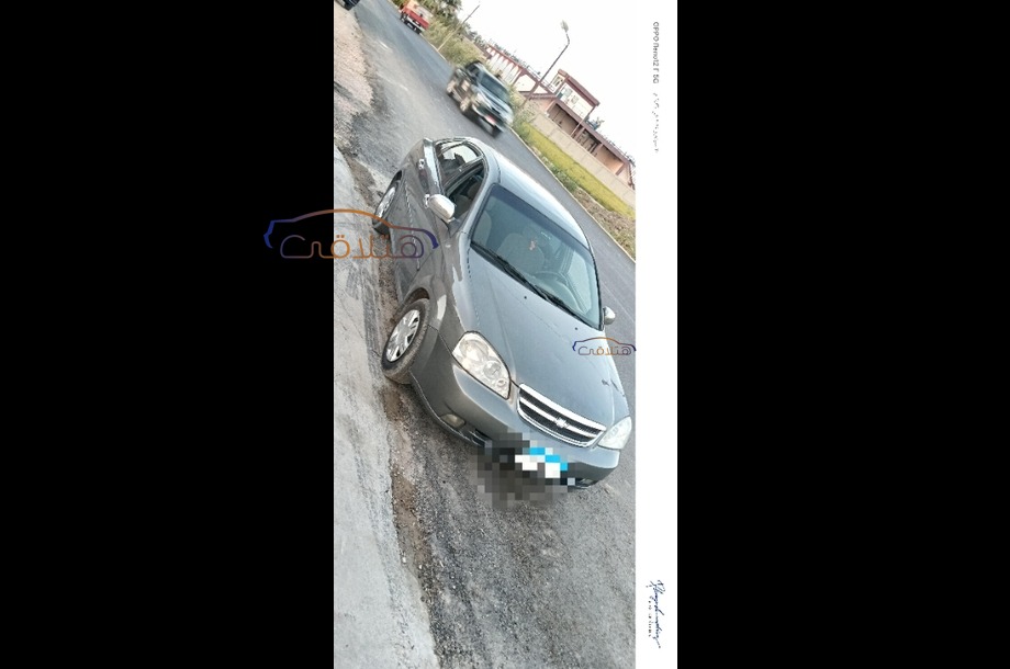 Optra Chevrolet رمادي