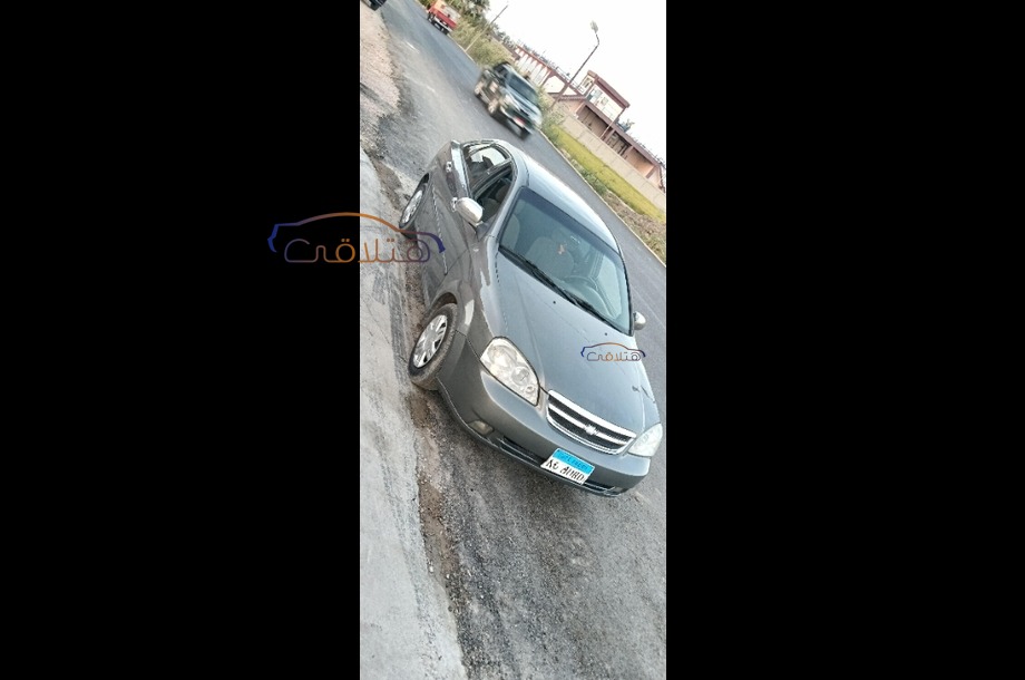 Optra Chevrolet رمادي