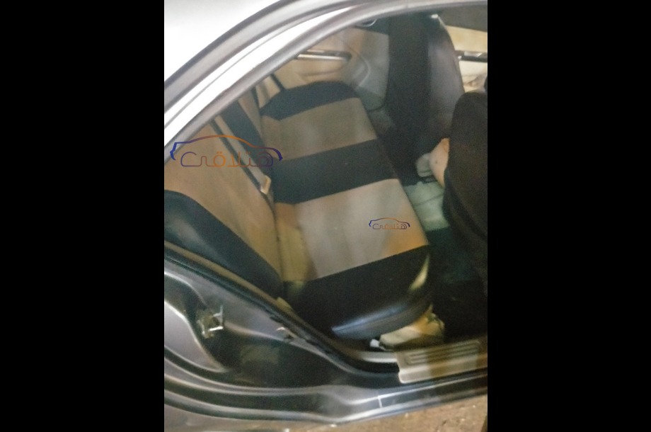 Optra Chevrolet رمادي