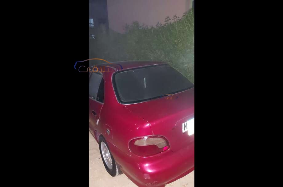 Accent Hyundai احمر غامق