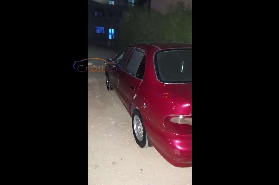 Accent Hyundai احمر غامق