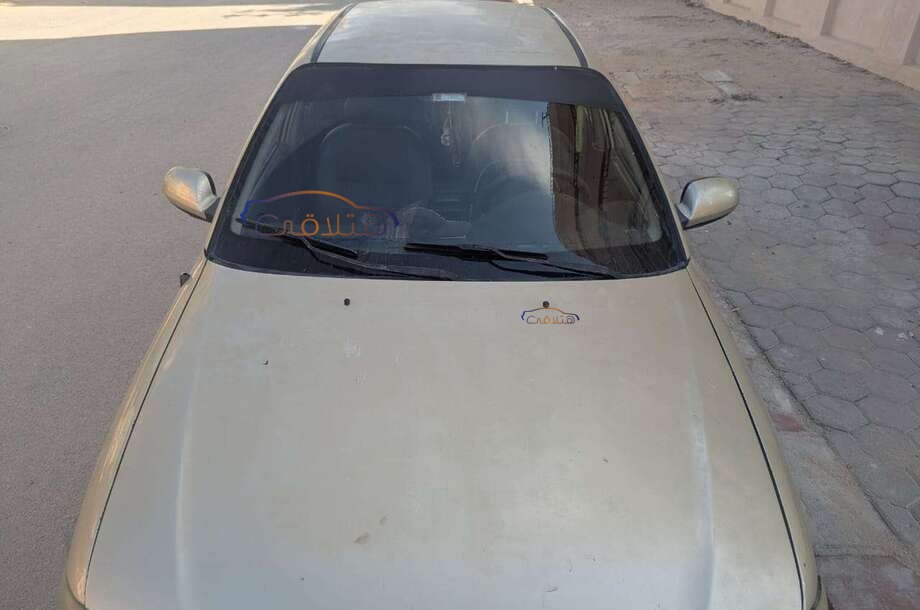 Accent Hyundai ذهبي