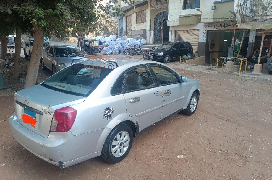 Optra Chevrolet فضي