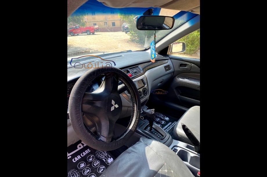 Lancer Puma Mitsubishi فضي