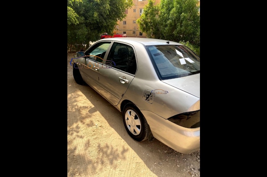 Lancer Puma Mitsubishi فضي