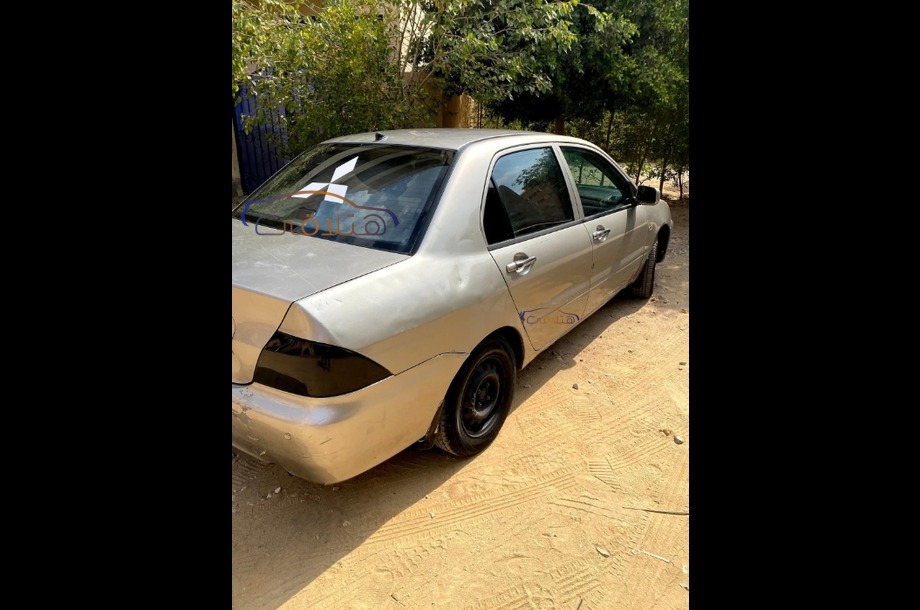 Lancer Puma Mitsubishi فضي