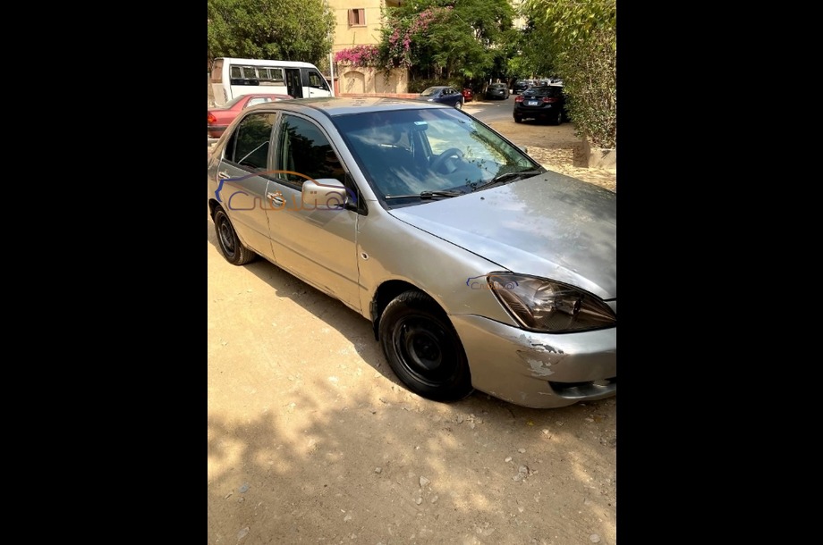 Lancer Puma Mitsubishi فضي