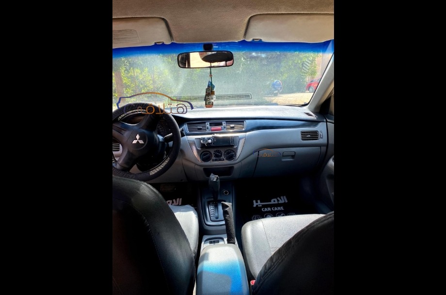Lancer Puma Mitsubishi فضي