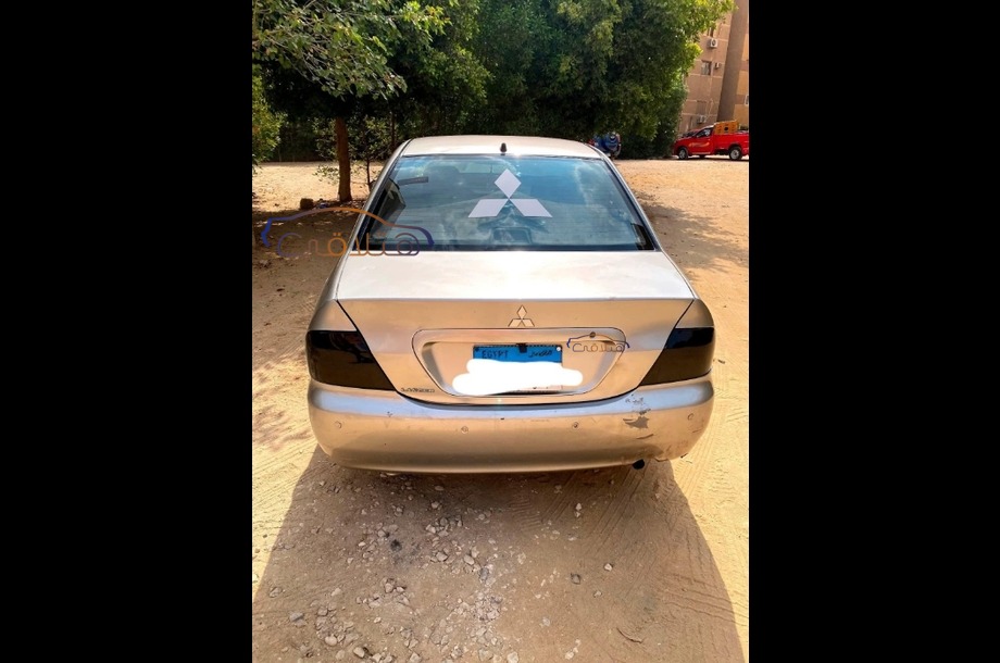 Lancer Puma Mitsubishi فضي